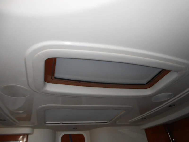 Slide: The Image of Ceiling interior of 2004 Sea Ray 420 Sundancer yacht with skylight. - 30