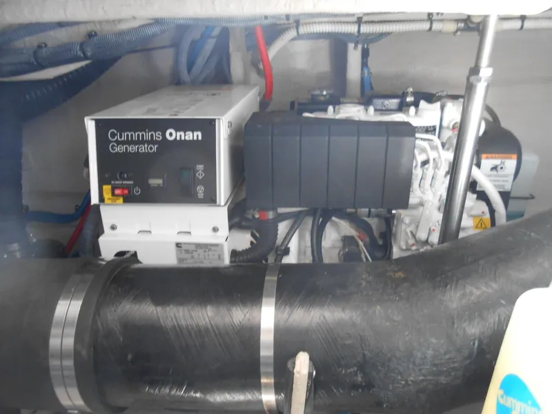 Slide: The Image of Cummins Onan generator in the engine room of a 2004 Sea Ray 420 Sundancer yacht. - 40
