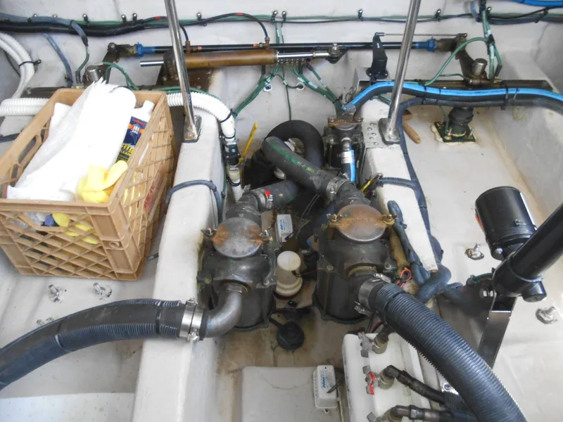 Slide: The Image of Engine compartment of a 2004 Sea Ray 420 Sundancer boat. - 42