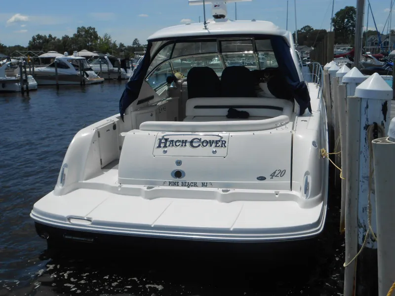 Slide: The Image of 2004 Sea Ray 420 Sundancer docked at marina. - 5