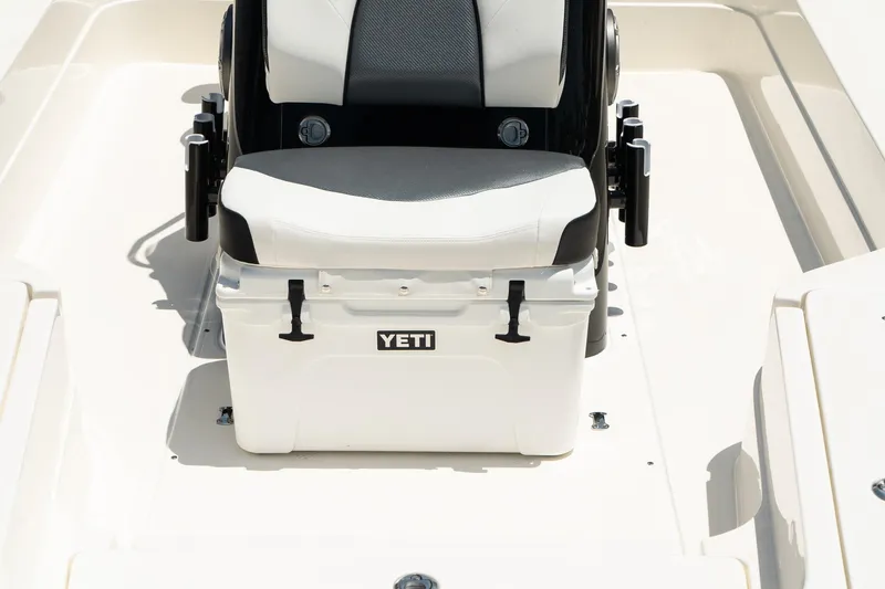 Slide: The Image of ShearWater X22 2025 boat with Yeti cooler seat on deck. - 12
