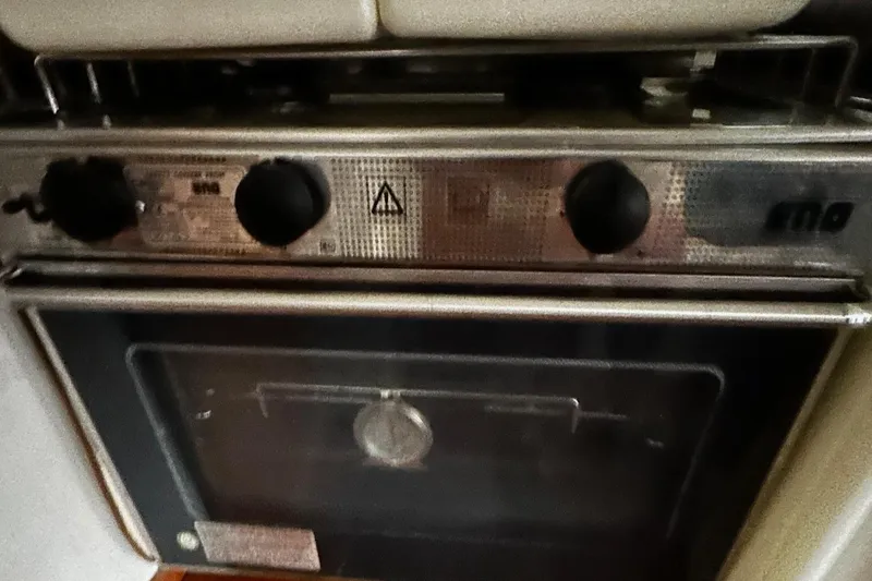 Slide: The Image of Stainless steel oven in a 2001 Lagoon 380 catamaran kitchen. - 15