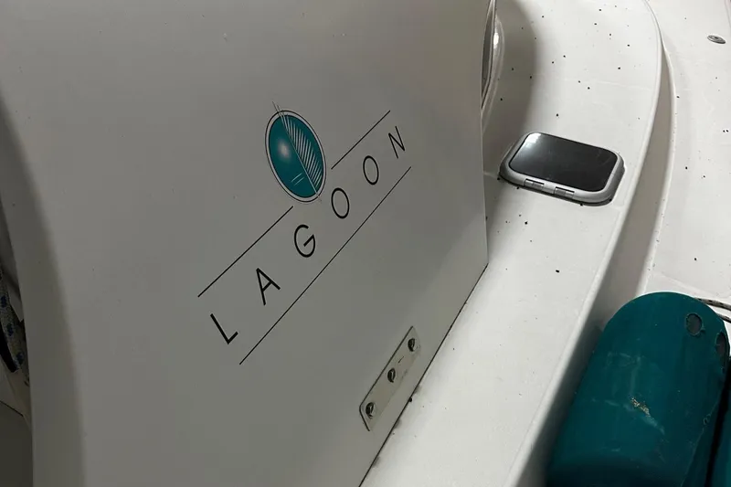 Slide: The Image of Lagoon 380 catamaran logo on white surface, 2001 model. - 3