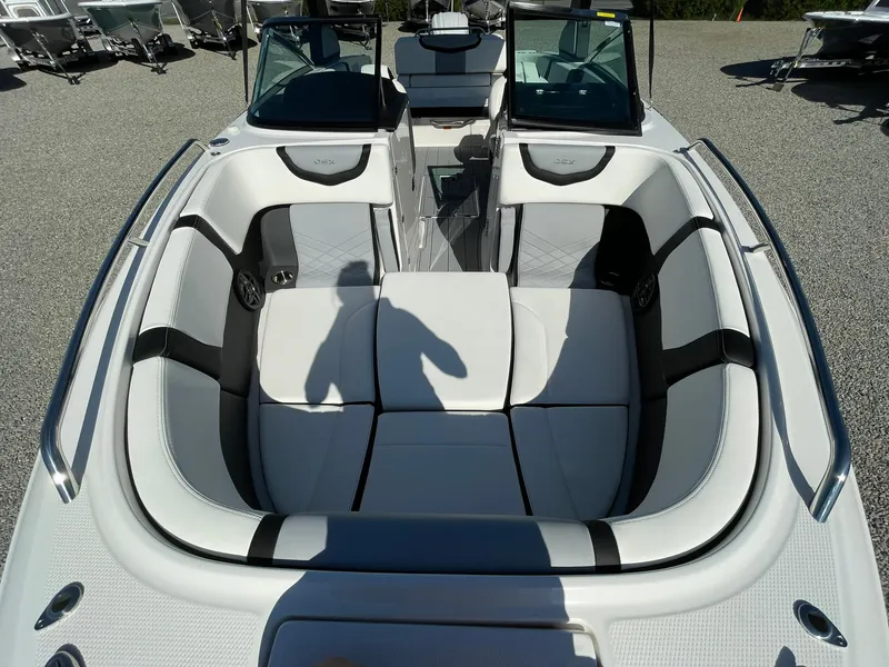 Slide: The Image of 2024 Chaparral 270 OSX boat interior with spacious seating and modern design. - 8