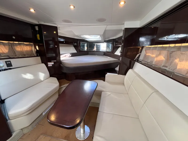 Slide: The Image of 2018 Sea Ray Sundancer 350 interior with elegant seating and modern design. - 25