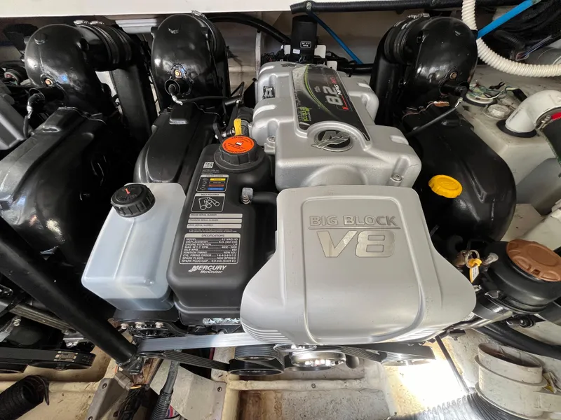 Slide: The Image of Engine compartment of a 2018 Sea Ray Sundancer 350 with a Big Block V8 engine. - 29