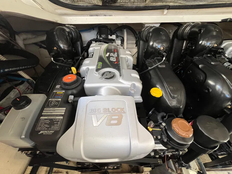 Slide: The Image of Engine compartment of a 2018 Sea Ray Sundancer 350 with a Big Block V8 engine. - 31
