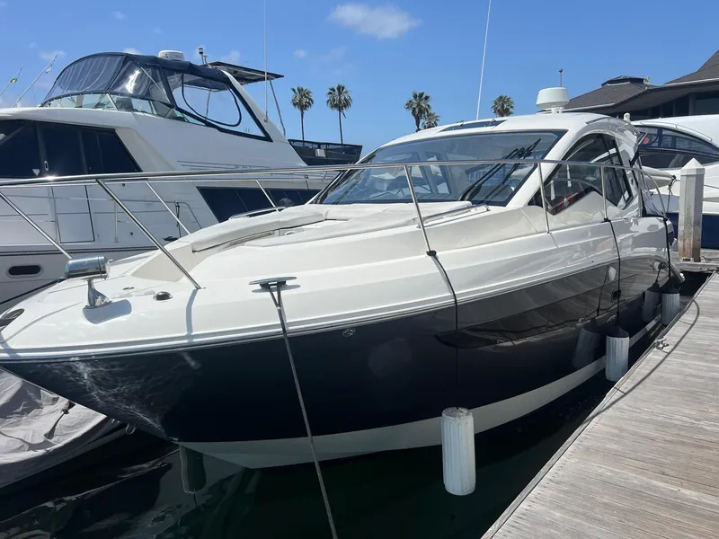 Slide: The Image of 2018 Sea Ray Sundancer 350 docked at marina on a sunny day. - 4