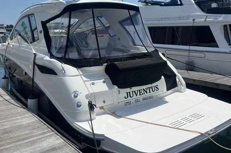 Slide: The Image of 2018 Sea Ray Sundancer 350 docked at a marina. - 5