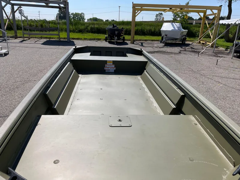 Slide: The Image of 2024 Crestliner 1546 Retriever boat interior, empty and ready for customization. - 2