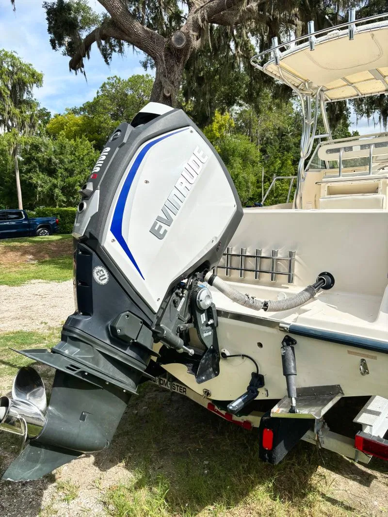 Slide: The Image of 2005 Key West 2300 Walkaround boat with Evinrude outboard motor. - 5