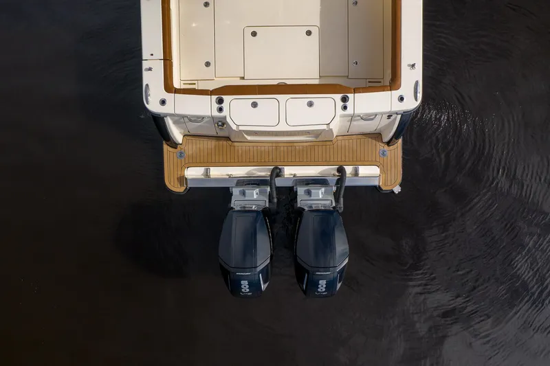 Slide: The Image of Top view of 2026 Scout 425 LXF boat with dual outboard engines. - 6