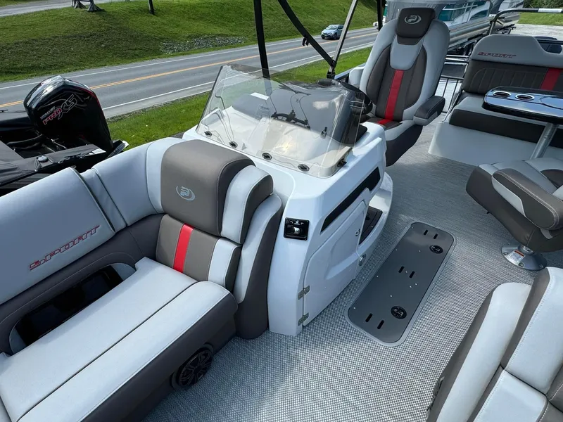 Slide: The Image of 2024 Princecraft VOGUE 23RL boat interior with modern seating and control console. - 13