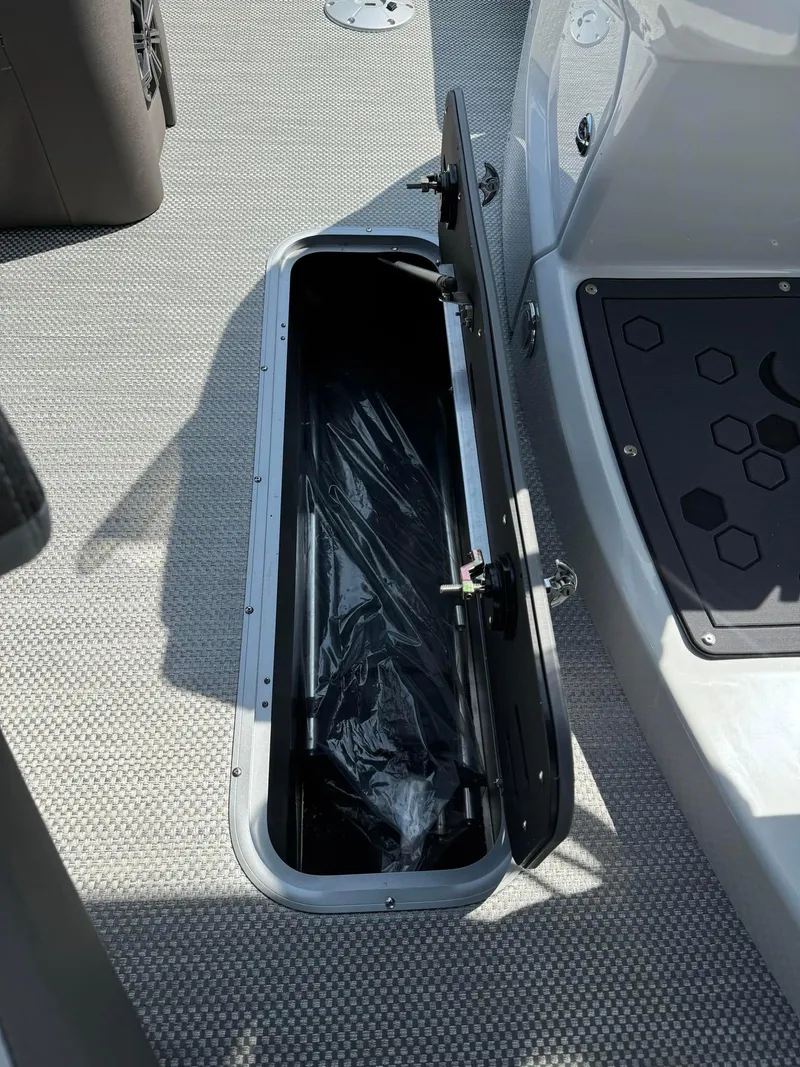 Slide: The Image of Open storage compartment on 2024 Princecraft VOGUE 23RL boat. - 19