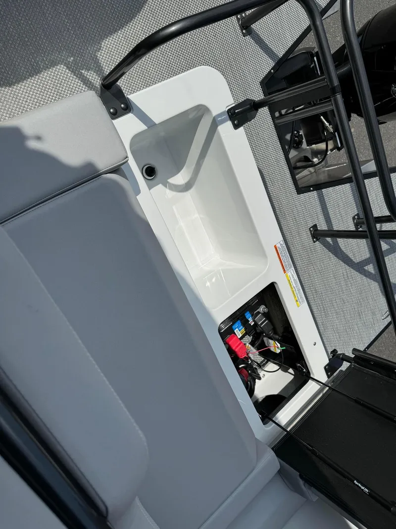 Slide: The Image of 2024 Princecraft VOGUE 23RL boat interior with storage compartments. - 23