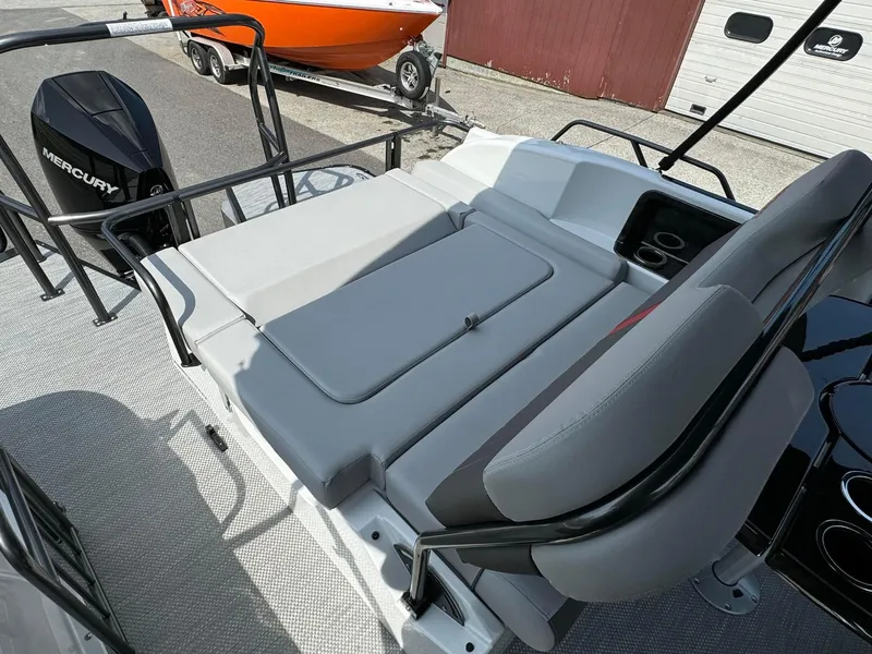 Slide: The Image of 2024 Princecraft VOGUE 23RL boat with Mercury engine and comfortable seating. - 26