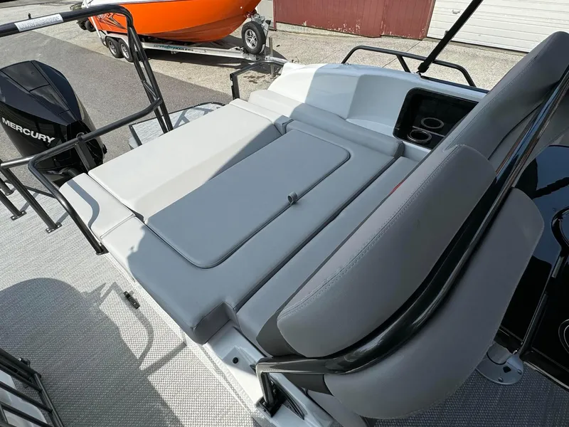 Slide: The Image of 2024 Princecraft VOGUE 23RL boat with Mercury engine and comfortable seating. - 28