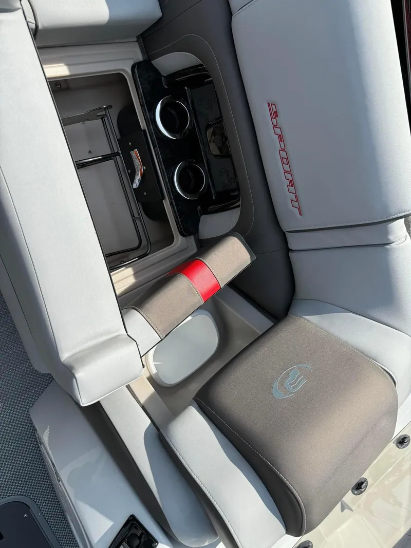 Slide: The Image of 2024 Princecraft VOGUE 23RL boat interior with cup holders and storage compartments. - 32