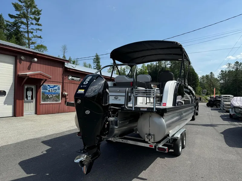 Slide: The Image of 2024 Princecraft VOGUE 23RL pontoon boat with black canopy and outboard motor. - 7