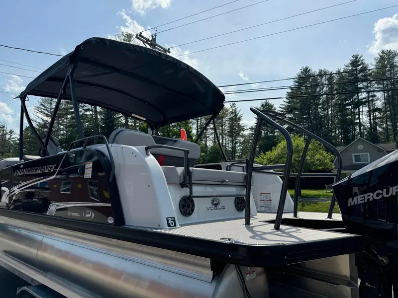Slide: The Image of 2024 Princecraft VOGUE 23RL pontoon boat with canopy and Mercury outboard motor. - 8