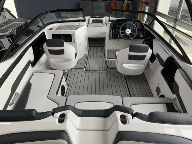 Slide: The Image of 2024 Yamaha Boats 195S interior with seating, steering wheel, and modern design. - 7