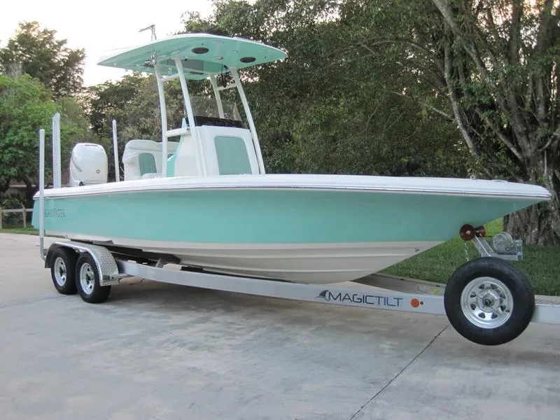 Slide: The Image of 2021 ShearWater 250 Carolina Bay boat on Magic Tilt trailer. - 1