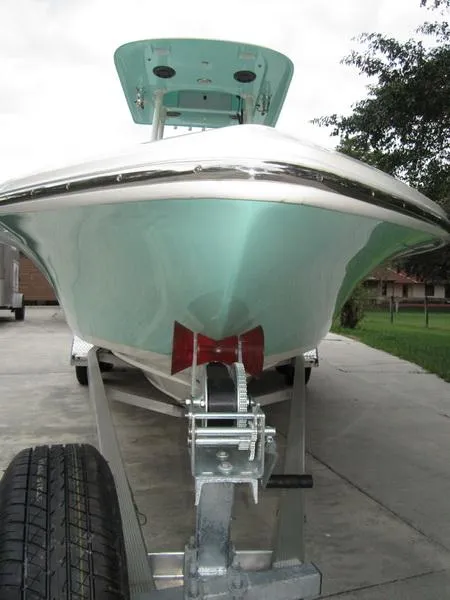 Slide: The Image of 2021 ShearWater 250 Carolina Bay boat on trailer, front view. - 11