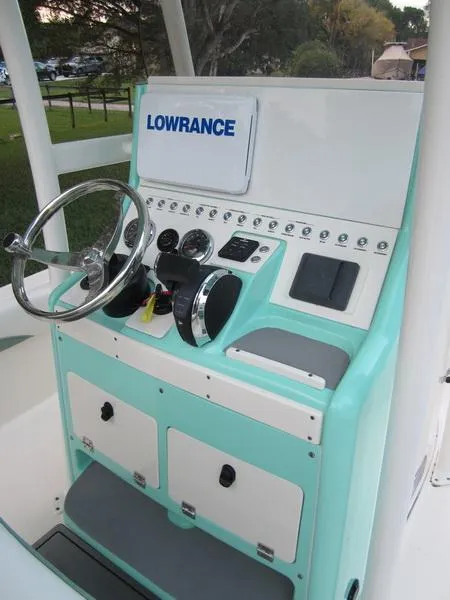 Slide: The Image of 2021 ShearWater 250 Carolina Bay boat console with Lowrance electronics. - 8