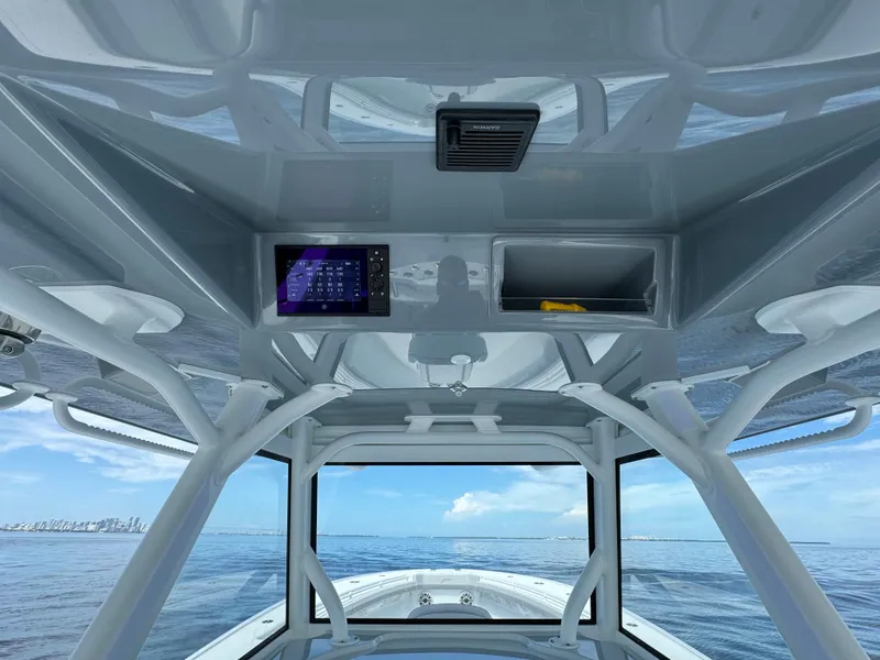 Slide: The Image of 2024 Yellowfin 39 boat interior with navigation system and ocean view. - 23