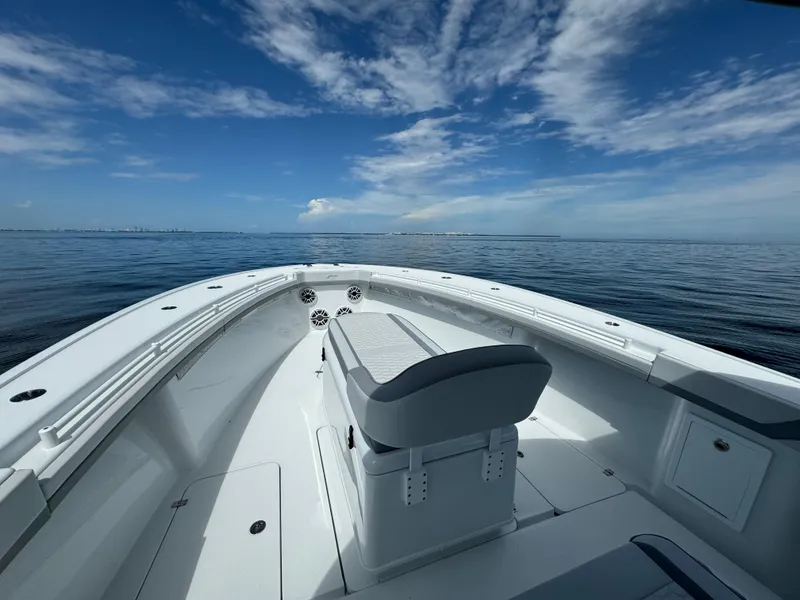 Slide: The Image of 2024 Yellowfin 39 boat on calm ocean with clear blue sky. - 25