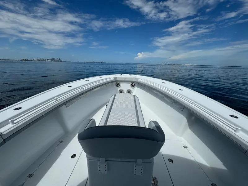 Slide: The Image of 2024 Yellowfin 39 boat on calm ocean with clear blue sky. - 26