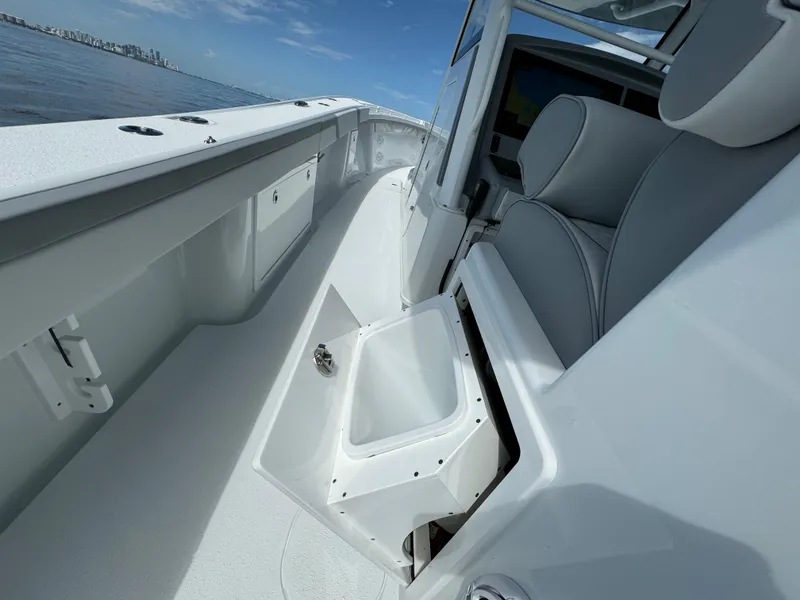 Slide: The Image of 2024 Yellowfin 39 boat interior with seating and storage compartments. - 35