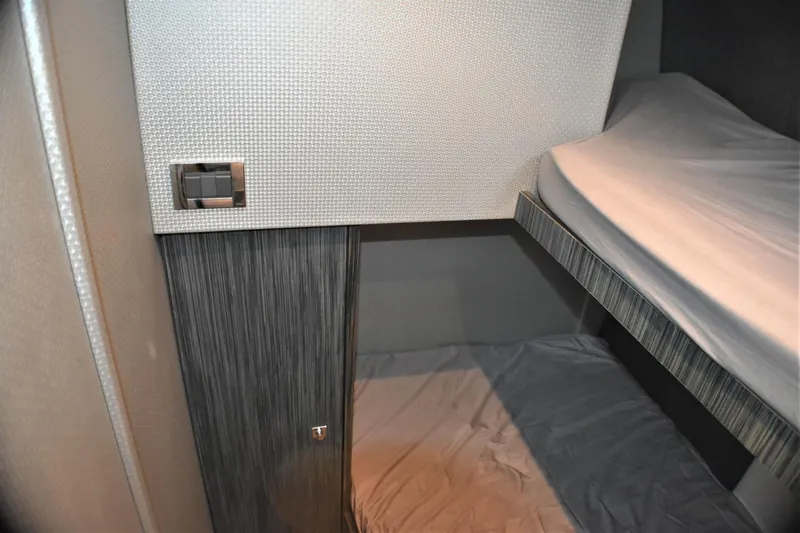 Slide: The Image of Interior cabin of 2019 Silverton 41 Sport Bridge yacht with bunk beds. - 19