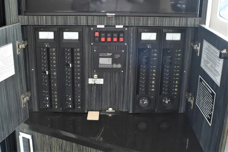Slide: The Image of Electrical control panel of a 2019 Silverton 41 Sport Bridge yacht. - 44