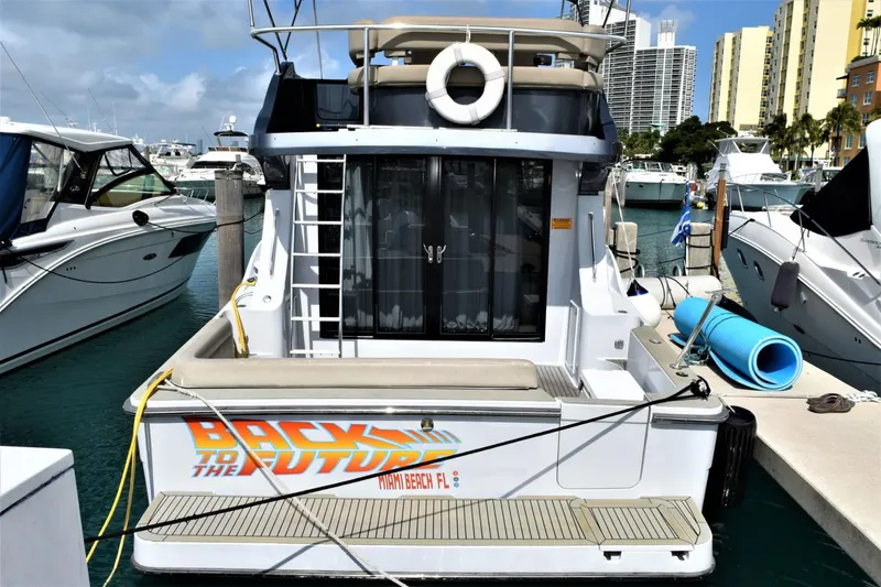 Slide: The Image of 2019 Silverton 41 Sport Bridge yacht docked, Back to the Future decal, Miami Beach, FL. - 5