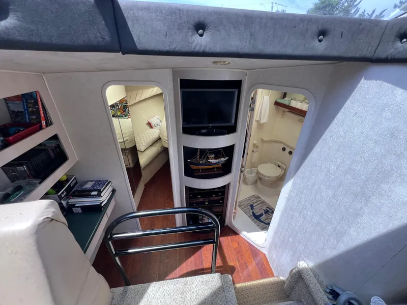 Slide: The Image of Interior of 1998 Mainship 47 Motor Yacht with cozy cabin and modern amenities. - 36