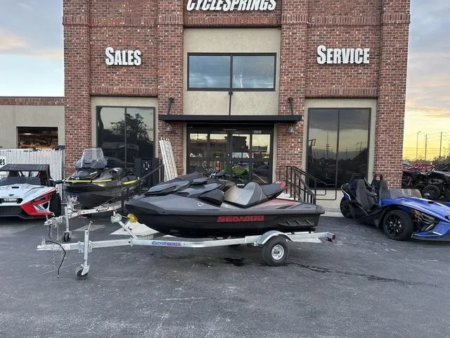 Slide: The Image of 2024 Sea-Doo Waverunner PWC GTR X 300 on Triton trailer, parked outdoors. - 1