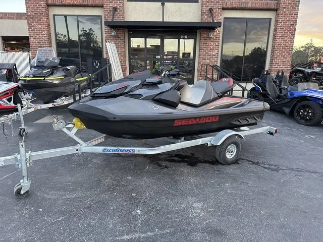 Slide: The Image of 2024 Sea-Doo Waverunner PWC GTR X 300 on trailer, parked outside dealership. - 10