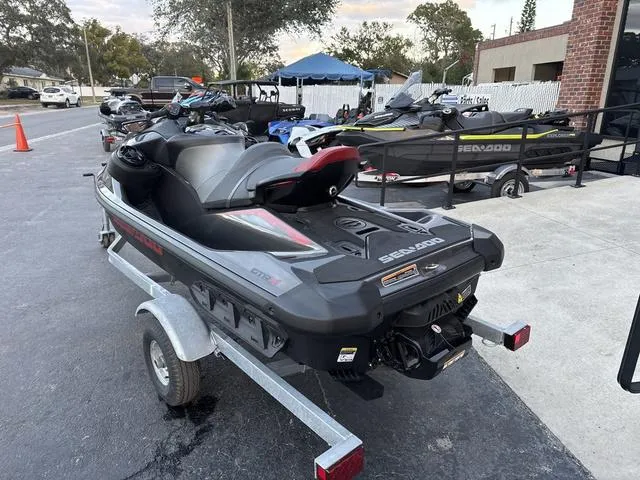 Slide: The Image of 2024 Sea-Doo Waverunner PWC GTR X 300, sleek design, advanced controls, black interior. - 6