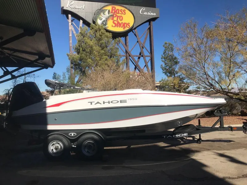 Slide: The Image of 2024 Tahoe 1950 boat on trailer at Bass Pro Shops parking lot. - 8