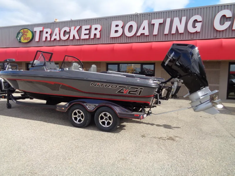Slide: The Image of 2024 Nitro ZV21 boat on trailer at Tracker Boating Center. - 1
