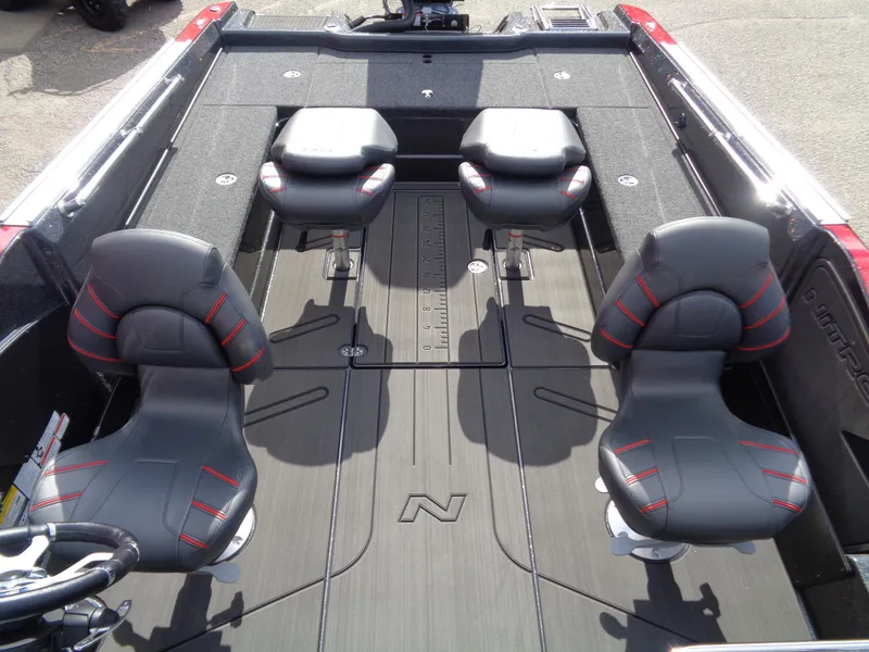 Slide: The Image of 2024 Nitro ZV21 boat interior with four black and red seats. - 7