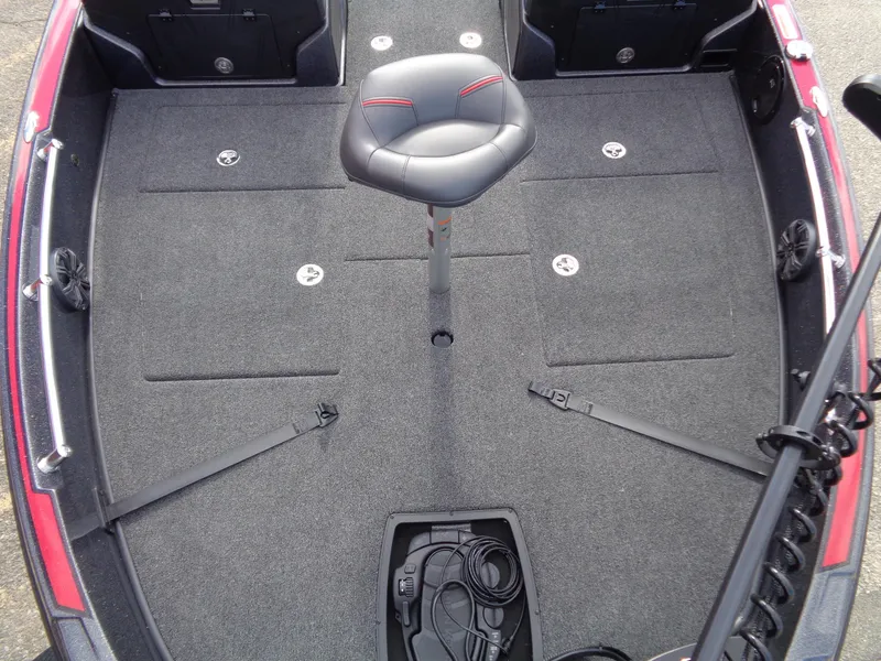 Slide: The Image of 2024 Nitro ZV21 boat deck with a central seat and storage compartments. - 9