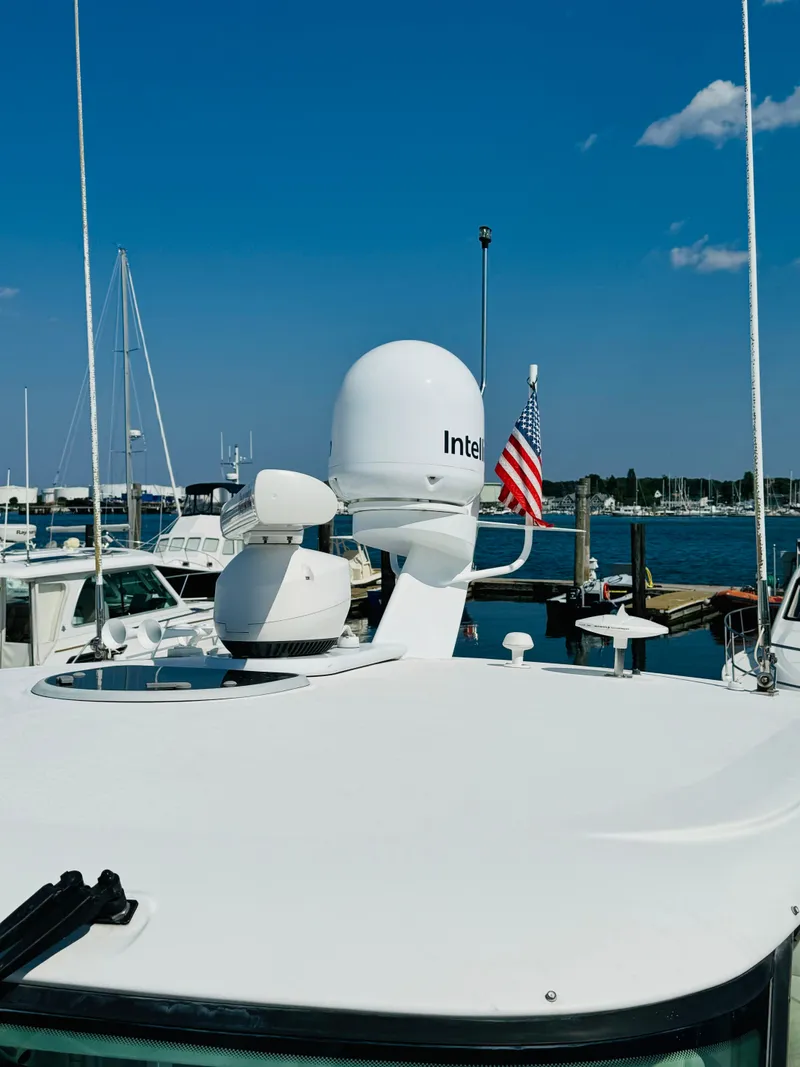 Slide: The Image of 2007 Tiara Yachts 3900 Sovran docked at a marina with radar equipment. - 36