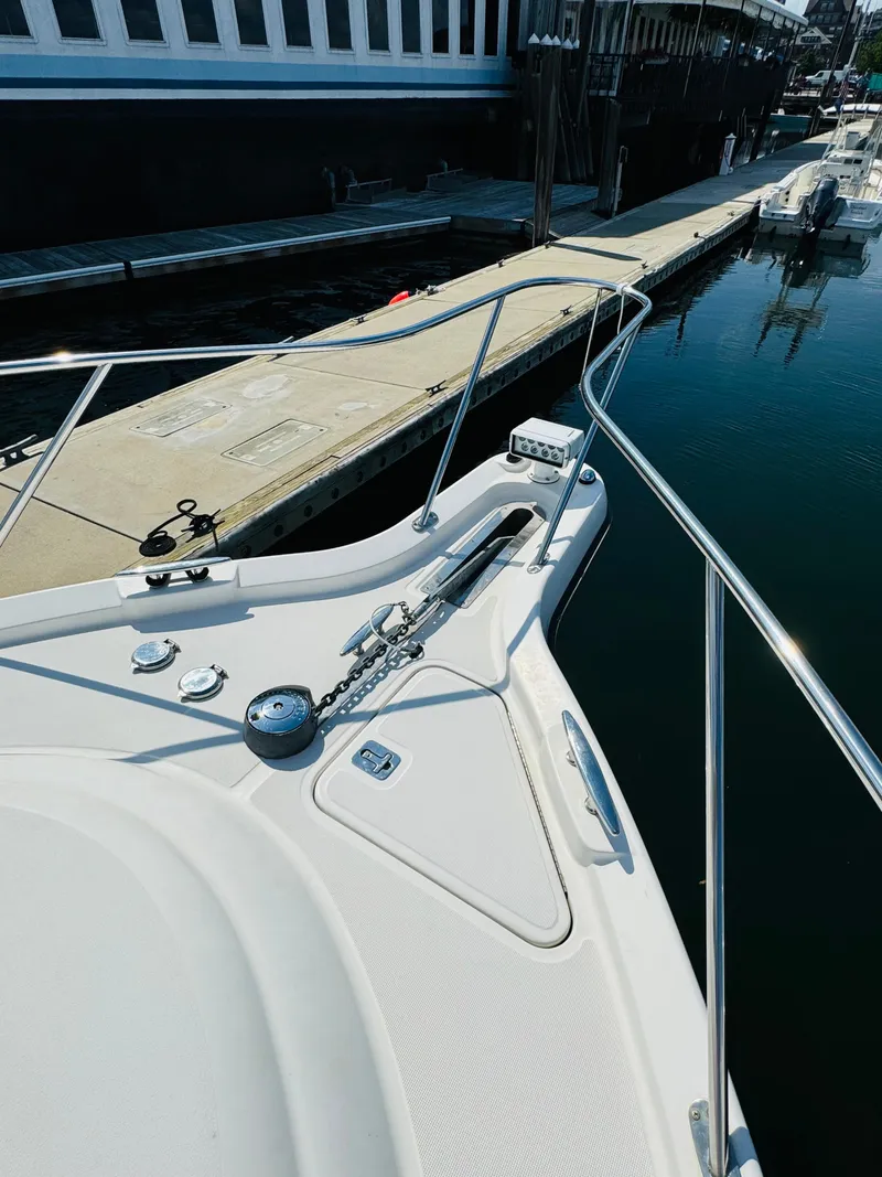 Slide: The Image of 2007 Tiara Yachts 3900 Sovran docked at a marina. - 38