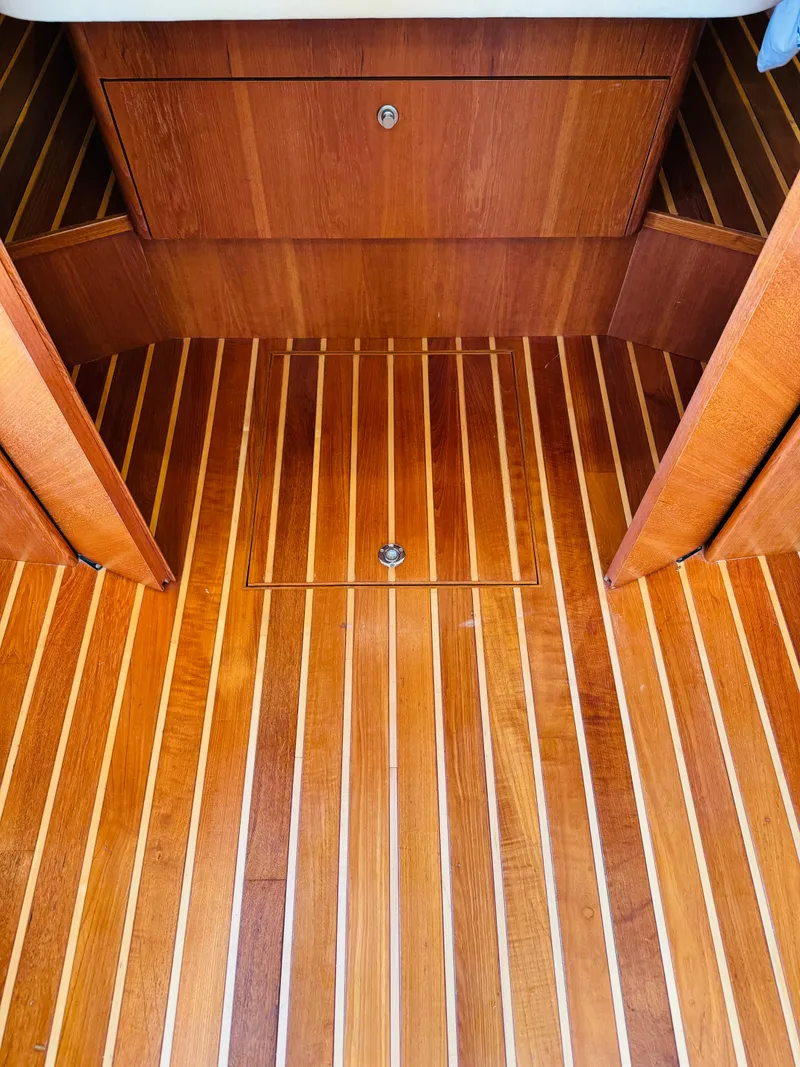 Slide: The Image of 2007 Tiara Yachts 3900 Sovran interior with polished wooden flooring. - 7