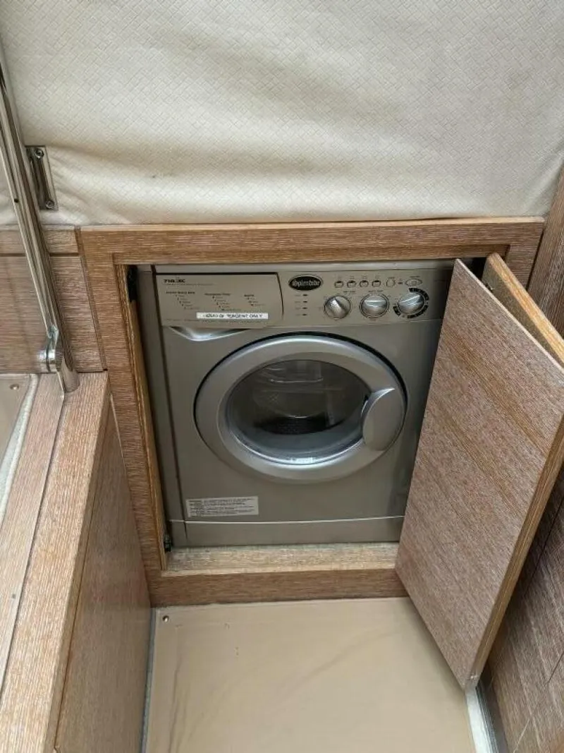 Slide: The Image of Built-in washing machine on 2013 Azimut 64 Fly yacht. - 16