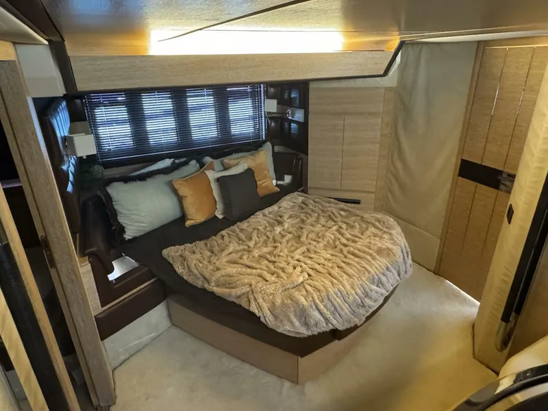 Slide: The Image of Luxurious bedroom interior of 2013 Azimut 64 Fly yacht with cozy bedding. - 22
