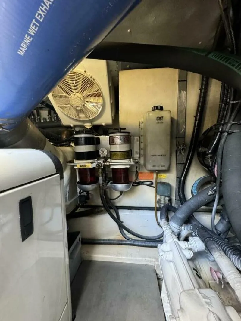 Slide: The Image of Engine room of a 2013 Azimut 64 Fly yacht showing mechanical components. - 36