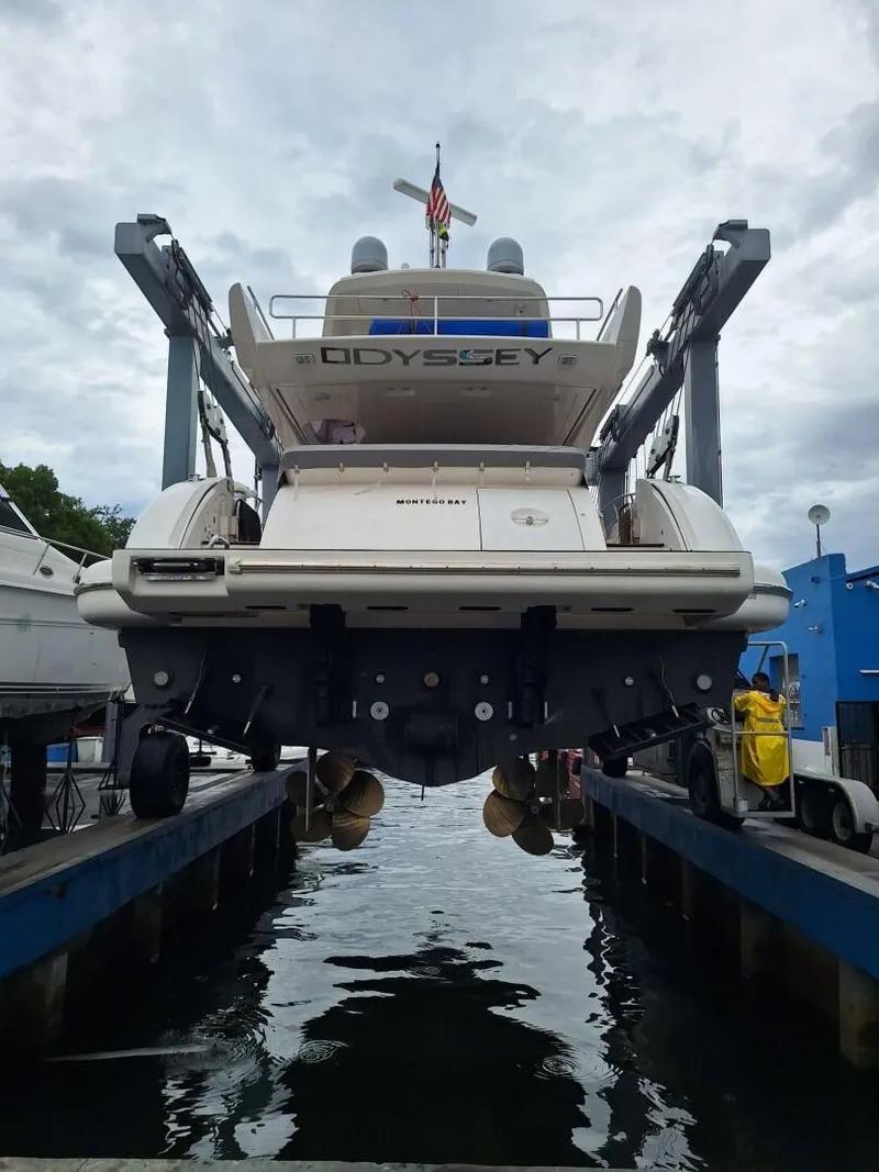 Slide: The Image of 2013 Azimut 64 Fly yacht named Odyssey in dry dock for maintenance. - 39